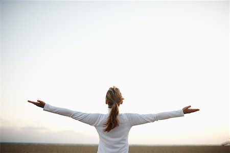 Woman Practicing Yoga on Beach, Santa Monica, California, USA Foto de stock - Con derechos protegidos, Código: 700-02265470