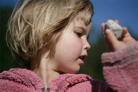 Girl with Stone in Hand, Italy Foto de stock - Con derechos protegidos, Código: 700-02265523