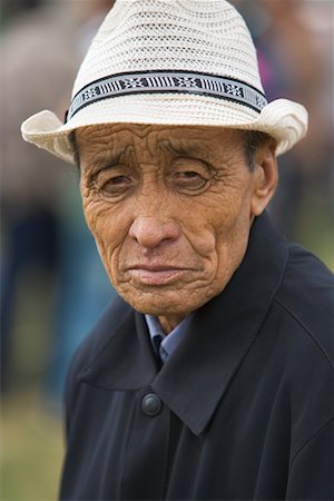 Portrait of Spectator at Naadam Festival in Xiwuzhumuqinqi, Inner Mongolia, China Foto de stock - Direito Controlado, Número: 700-02265739