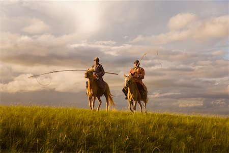 Horsemen in Inner Mongolia, China Foto de stock - Con derechos protegidos, Código: 700-02265733