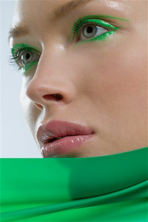 Close-up of Woman with Green Eyes and Eye Shadow Foto de stock - Con derechos protegidos, Código: 700-02260154