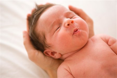 Gros plan du nouveau-né bébé fille Photographie de stock - Rights-Managed, Code: 700-02263911