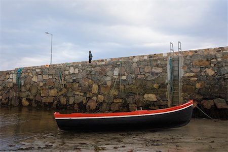 Row Boat Beached by Stone Wall, Spiddal, County Galway, Ireland Stock Photo - Rights-Managed, Code: 700-02289033