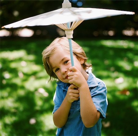 sun umbrella - Portrait of Little Boy Holding Parasol, Malibu, California, USA Stock Photo - Rights-Managed, Code: 700-02289210