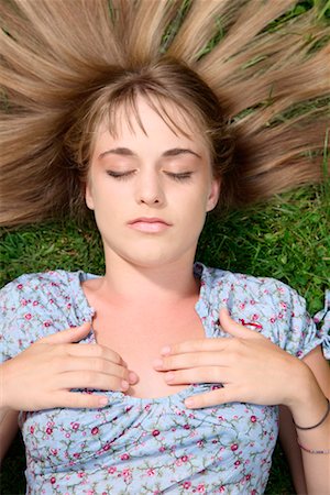 Woman Lying on Lawn Stock Photo - Rights-Managed, Code: 700-02289279