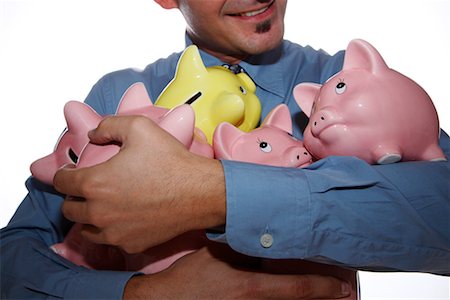 retirement and savings - Man Holding Piggy Banks in Arms Stock Photo - Rights-Managed, Code: 700-02289297