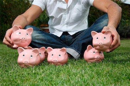 financial nest egg - Man on Grass with Piggy Banks Stock Photo - Rights-Managed, Code: 700-02289314