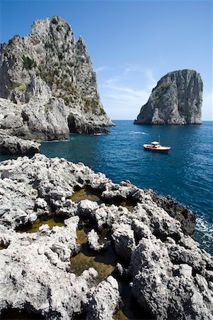 Faraglioni, Gulf of Naples, Capri, Naples, Campania, Italy Stock Photo - Rights-Managed, Code: 700-02289525