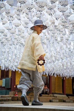 Buddhist Monk under Lanters, Bongeunsa Temple, Seoul, South Korea Stock Photo - Rights-Managed, Code: 700-02289620