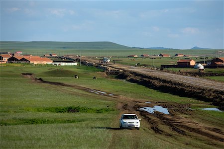 Car on Dirt Road by Village, Inner Mongolia, China Stock Photo - Rights-Managed, Code: 700-02314948