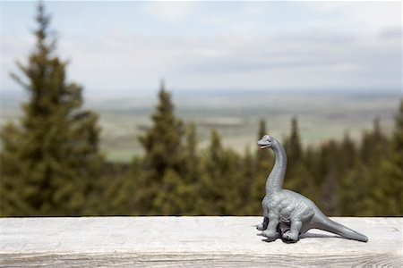 Spielzeug Dinosaurier auf Geländer, Grasslands Nationalpark, Saskatchewan, Kanada Stockbilder - Lizenzpflichtiges, Bildnummer: 700-02332743