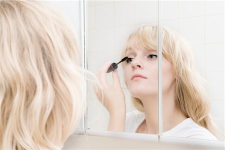 Woman Applying Mascara Stock Photo - Rights-Managed, Code: 700-02345967