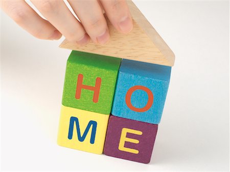 Hand Making House from Building Blocks Stock Photo - Rights-Managed, Code: 700-02346259