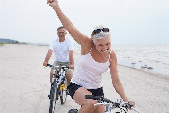 Couple Riding Bikes on the Beach, Elmvale, Ontario, Canada Stock Photo - Premium Rights-Managed, Artist: Jerzyworks, Image code: 700-02346556