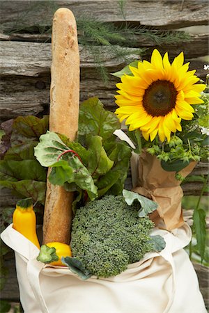 Cloth Bag with Groceries and Sunflower by Wooden Fence Stock Photo - Rights-Managed, Code: 700-02347782