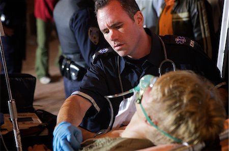 Paramedic with Injured Man, Toronto, Ontario, Canada Stock Photo - Rights-Managed, Code: 700-02348186