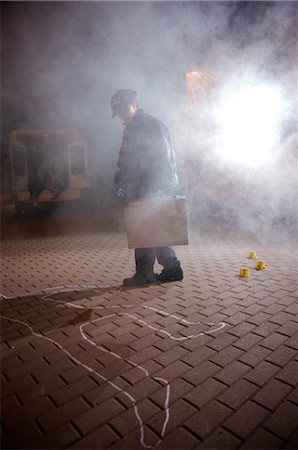 police investigator at work - Police Officer at Crime Scene, Toronto, Ontario, Canada Stock Photo - Rights-Managed, Code: 700-02348189