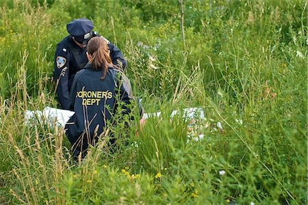 simsearch:700-02348237,k - Police Officers with Woman's Body in Field, Toronto, Ontario, Canada Stock Photo - Rights-Managed, Code: 700-02348203