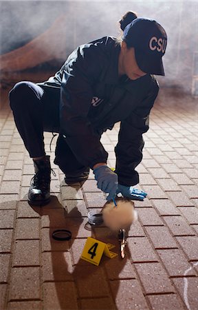 police woman - Police Investigator on Crime Scene, Toronto, Ontario, Canada Stock Photo - Rights-Managed, Code: 700-02348244