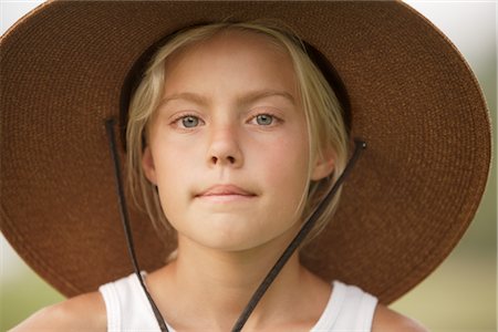 preteen girls faces close ups - Portrait of Girl Wearing Hat Stock Photo - Rights-Managed, Code: 700-02348770