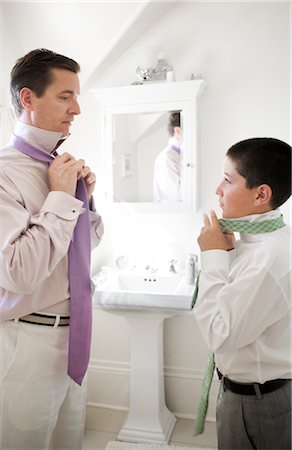 father son bathroom not illustration not monochrome - Father and Song Getting Ready for a Wedding, Father Teaching Son How to Tie a Necktie Stock Photo - Rights-Managed, Code: 700-02348999