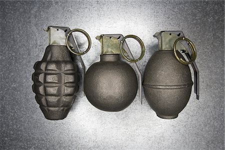 Pineapple-style Grenade, NATO Era Grenade, and Vietnam Era Grenade Stock Photo - Rights-Managed, Code: 700-02377119