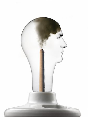 education concept - Smokestack in Face-Shaped Lightbulb Foto de stock - Con derechos protegidos, Código: 700-02377609