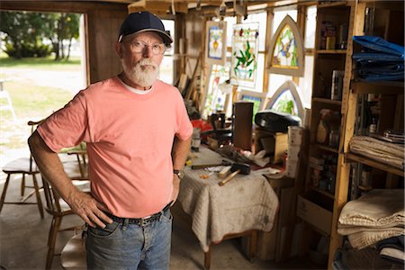 Portrait of Man in Furniture Repair Workshop Fotografie stock - Rights-Managed, Codice: 700-02377922