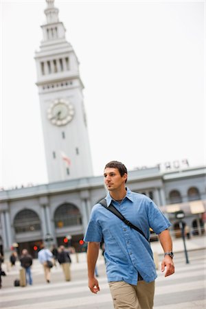 people looking walking in the city - Man Walking by Clock Tower, San Francisco, California, USA Stock Photo - Rights-Managed, Code: 700-02386006