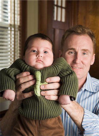 dad holding newborn baby - Father and Son Stock Photo - Rights-Managed, Code: 700-02386093