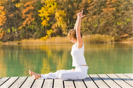 simsearch:700-02428627,k - Woman Practicing Yoga on Dock, Fuschlsee, Salzkammergut, Salzburg, Austria Foto de stock - Con derechos protegidos, Código: 700-02428605