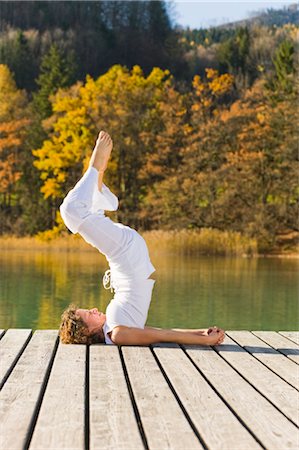 simsearch:700-02428627,k - Woman Practicing Yoga on Dock, Fuschlsee, Salzkammergut, Salzburg, Austria Foto de stock - Con derechos protegidos, Código: 700-02428611