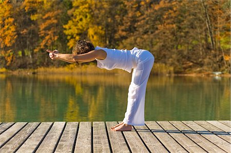 simsearch:700-02428627,k - Woman Practicing Yoga on Dock, Fuschlsee, Salzkammergut, Salzburg, Austria Foto de stock - Con derechos protegidos, Código: 700-02428625