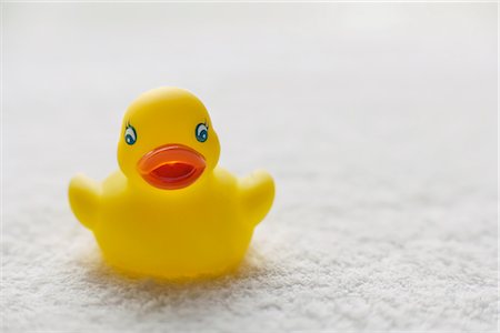 rubber duck - Rubber Duck on Towel Stock Photo - Rights-Managed, Code: 700-02461599