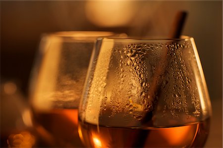 Hot Beverage in Wine Glass with Cinnamon Stock Photo - Rights-Managed, Code: 700-02461612