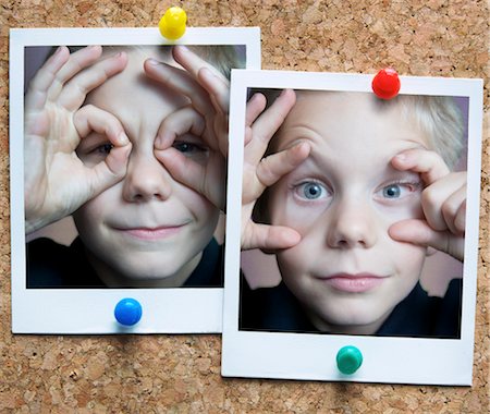 Photographies de garçon sur le tableau de visages Photographie de stock - Rights-Managed, Code: 700-02590932