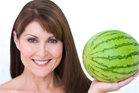 simsearch:700-01296030,k - Portrait of Woman Holding a Watermelon Foto de stock - Con derechos protegidos, Código: 700-02637841