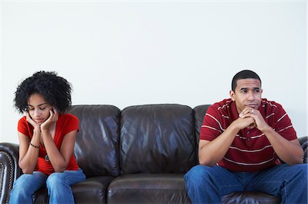 Couple Ignoring Each Other on Sofa Stock Photo - Rights-Managed, Code: 700-02637902