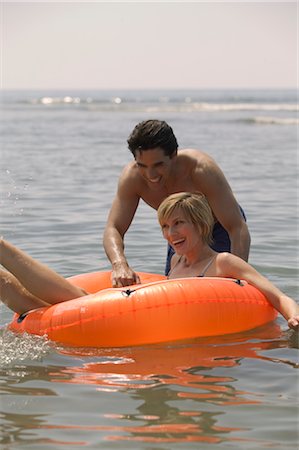 Couple Playing in Water Stock Photo - Rights-Managed, Code: 700-02645892