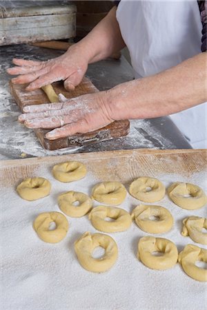Woman Baking Ring-Shaped Cakes, Cerreto Laziale, Tivoli, Rome, Italy Stock Photo - Rights-Managed, Code: 700-02659605