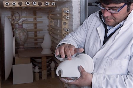 Man Checking Ceramics near Kiln Stock Photo - Rights-Managed, Code: 700-02669967