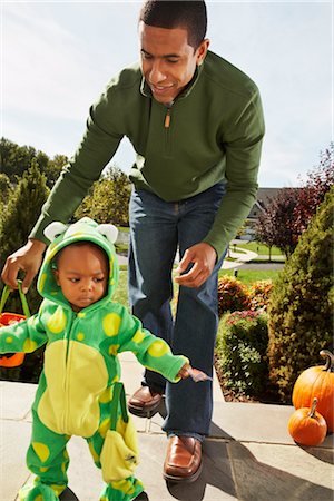 suburban family lifestyle - Toddler Trick-or-Treating with Father Stock Photo - Rights-Managed, Code: 700-02670117