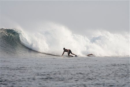 Surfeur bas tournant à poulets Surf Break, North Male Atoll, Maldives Photographie de stock - Rights-Managed, Code: 700-02670167