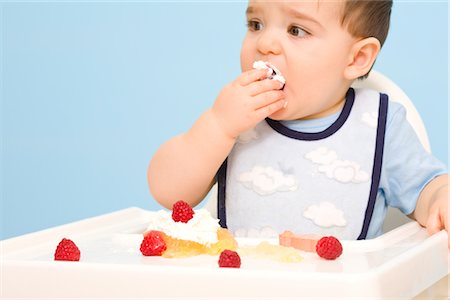 Baby Eating in High Chair Stock Photo - Rights-Managed, Code: 700-02670491