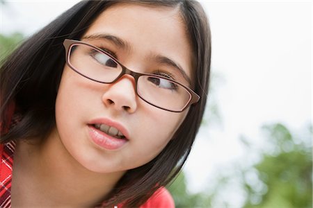 Cross-eyed girl isolated on white Stock Photo