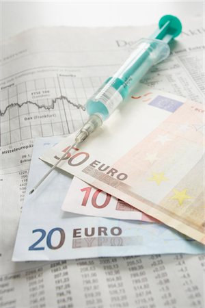 Syringe, Money and Financial Pages Stock Photo - Rights-Managed, Code: 700-02671316