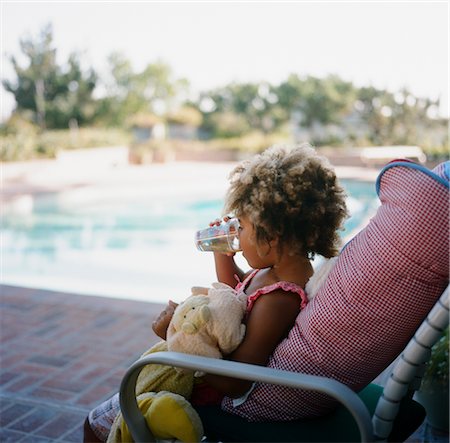 Girl Having Drink by Pool Stock Photo - Rights-Managed, Code: 700-02686095