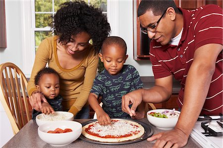 four dinner - Family in the Kitchen Making a Pizza Stock Photo - Rights-Managed, Code: 700-02686565