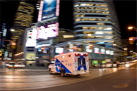 simsearch:700-02694369,k - Ambulance, Yonge Street, Toronto, Ontario, Canada Stock Photo - Rights-Managed, Code: 700-02694382