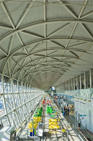 Interior of Kansai Airport, Osaka, Japan, in the International Departures  lounge. View into the Cartier store with Cartier logo over the entrance  Stock Photo - Alamy